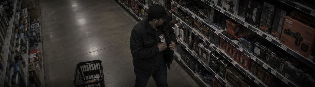 Retail store aisle, theft in progress