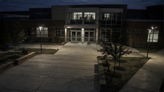 School campus entrance at dusk