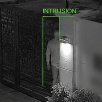 Real camera frame: intrusion detected at the main gate